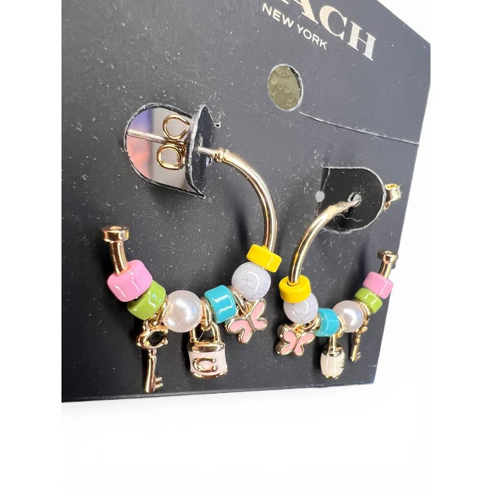 NWT Coach Padlock Multi Charm Huggie Earrings  Gold Beaded Butterfly Key Logo - Picture 3 of 6